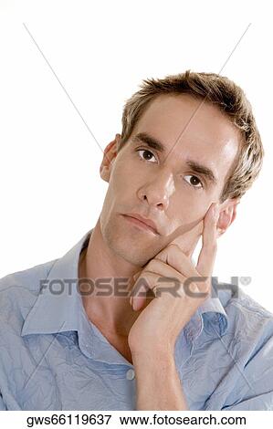 Portrait of a mid adult man thinking View Large Photo Image Stock Photo - Portrait of a mid adult man thinking. Fotosearch