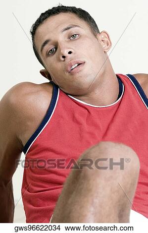 Portrait of a young man relaxing View Large Photo Image Picture - Portrait of a young man relaxing. Fotosearch