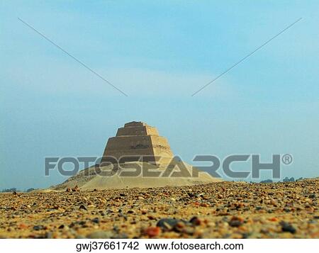 Stock Image - Pyramid in a desert. Fotosearch