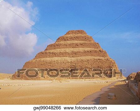 Pyramid in an arid landscape, The Step Pyramid Of Zoser, Saqqara, Egypt View Large Photo Image Stock Photograph - Pyramid in an arid landscape, The Step Pyramid Of Zoser, Saqqara, Egypt. Fotosearch