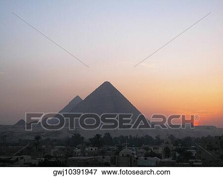 Pyramids at dusk, Giza Pyramids, Giza, Cairo, Egypt View Large Photo Image Stock Photo - Pyramids at dusk, Giza Pyramids, Giza, Cairo, Egypt. Fotosearch