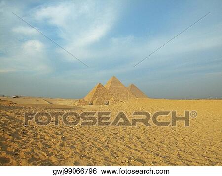 Pyramids on a landscape, Giza Pyramids, Giza, Cairo, Egypt View Large Photo Image Stock Photograph - Pyramids on a landscape, Giza Pyramids, Giza, Cairo, Egypt. Fotosearch