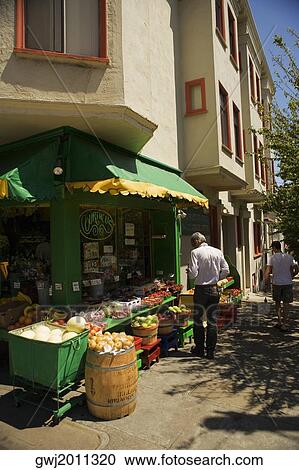 Rear view of a man shopping at fruit store View Large Photo Image Stock Image - Rear view of a man shopping at fruit store. Fotosearch