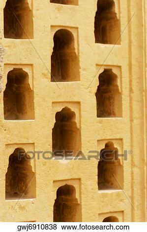 Shelves carved on the wall, Rajmahal, Jaisalmer, Rajasthan, India View Large Photo Image Stock Photo - Shelves carved on the wall, Rajmahal, Jaisalmer, Rajasthan, India. Fotosearch