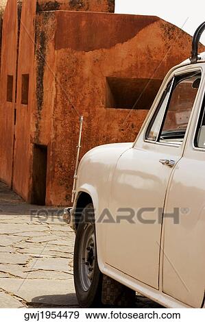 Side profile of a parked car, Jaigarh Fort, Jaipur, Rajasthan, India View Large Photo Image Stock Photo - Side profile of a parked car, Jaigarh Fort, Jaipur, Rajasthan, India. Fotosearch