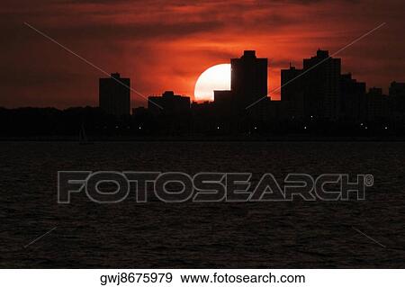 Silhouette of buildings at sunset, Chicago, Illinois, USA View Large Photo Image Stock Photo - Silhouette of buildings at sunset, Chicago, Illinois, USA. Fotosearch