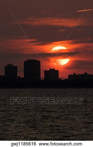 Silhouette of buildings at sunset, Chicago, Illinois, USA View Large Photo Image Stock Photograph - Silhouette of buildings at sunset, Chicago, Illinois, USA. Fotosearch