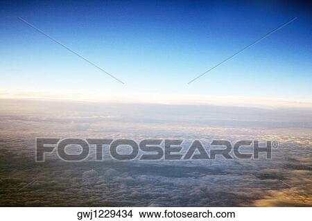 Picture - Sky and clouds seen from an airplane. Fotosearch