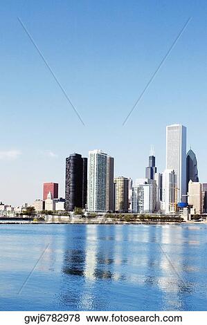 Skyscrapers along a lake, Lake Michigan, Chicago, Illinois, USA View Large Photo Image Stock Photo - Skyscrapers along a lake, Lake Michigan, Chicago, Illinois, USA. Fotosearch