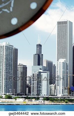 Skyscrapers by the lake, Navy Pier, Chicago, Illinois, USA View Large Photo Image Stock Image - Skyscrapers by the lake, Navy Pier, Chicago, Illinois, USA. Fotosearch