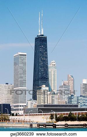 Skyscrapers in a city by the lake, Chicago, Illinois, USA View Large Photo Image Stock Photo - Skyscrapers in a city by the lake, Chicago, Illinois, USA. Fotosearch