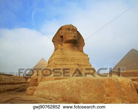 Sphinx in front of pyramids, Giza, Cairo, Egypt View Large Photo Image Stock Image - Sphinx in front of pyramids, Giza, Cairo, Egypt. Fotosearch
