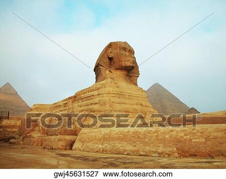 Sphinx in front of pyramids, Giza, Cairo, Egypt View Large Photo Image Stock Photo - Sphinx in front of pyramids, Giza, Cairo, Egypt. Fotosearch