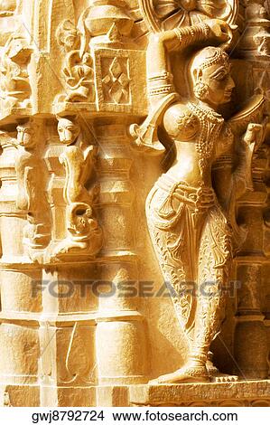 Picture - Statues carved on the wall of a temple, Jaisalmer, Rajasthan, India. Fotosearch