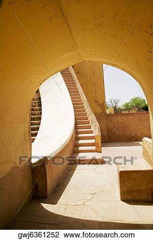 Steps viewed from an arched doorway, Jantar Mantar, Jaipur, Rajasthan, India View Large Photo Image Stock Image - Steps viewed from an arched doorway, Jantar Mantar, Jaipur, Rajasthan, India. Fotosearch