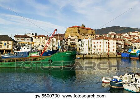 Tugboat anchored in the sea View Large Photo Image Stock Image - Tugboat anchored in the sea. Fotosearch