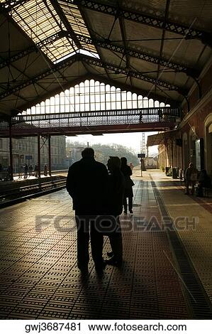 Two men standing on the railroad station platform, Spain View Large Photo Image Stock Image - Two men standing on the railroad station platform, Spain. Fotosearch