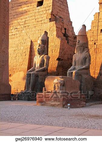 Two statues in a temple, Temple Of Luxor, Luxor, Egypt View Large Photo Image Stock Image - Two statues in a temple, Temple Of Luxor, Luxor, Egypt. Fotosearch