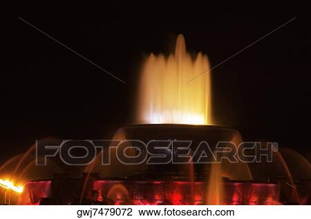 Water fountain lit up at night, Clarence Buckingham Fountain, Chicago, Illinois, USA View Large Photo Image Stock Image - Water fountain lit up at night, Clarence Buckingham Fountain, Chicago, Illinois, USA. Fotosearch