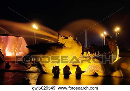 Water fountain lit up at night, Clarence Buckingham Fountain, Chicago, Illinois, USA View Large Photo Image Stock Photo - Water fountain lit up at night, Clarence Buckingham Fountain, Chicago, Illinois, USA. Fotosearch