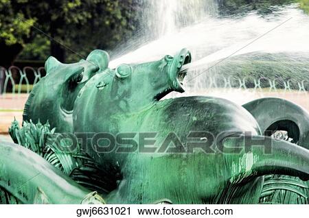 Water spraying from the mouth of a bronze statue, Clarence Buckingham Fountain, Chicago, Illinois, USA View Large Photo Image Stock Image - Water spraying from the mouth of a bronze statue, Clarence Buckingham Fountain, Chicago, Illinois, USA. Fotosearch