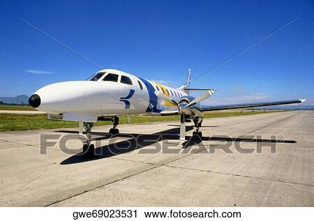 Stock Image - Airplane on the runway. Fotosearch