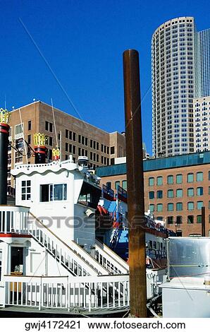Boat in front of skyscrapers, Boston, Massachusetts, USA View Large Photo Image Stock Image - Boat in front of skyscrapers, Boston, Massachusetts, USA. Fotosearch