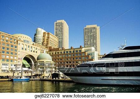Buildings at a waterfront, Rowes Wharf, Boston Harbor, Boston, Massachusetts, USA View Large Photo Image Stock Photo - Buildings at a waterfront, Rowes Wharf, Boston Harbor, Boston, Massachusetts, USA. Fotosearch
