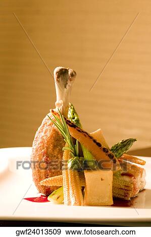Chicken drumstick served with salad View Large Photo Image Stock Photo - Chicken drumstick served with salad. Fotosearch