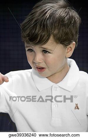 Close-up of a boy View Large Photo Image Stock Image - Close-up of a boy. Fotosearch