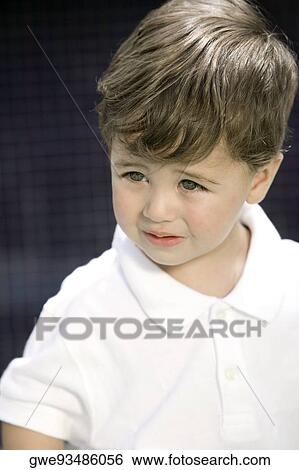 Close-up of a boy View Large Photo Image Stock Photograph - Close-up of a boy. Fotosearch