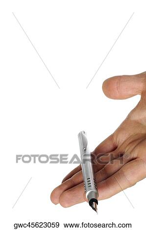 Stock Photo - Close-up of a businessman holding a pen. Fotosearch