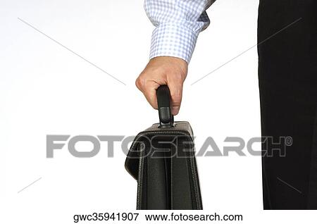 Close-up of a businessman holding a briefcase View Large Photo Image Stock Photo - Close-up of a businessman holding a briefcase. Fotosearch