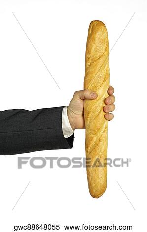Close-up of a businessman holding a loaf of bread View Large Photo Image Stock Photography - Close-up of a businessman holding a loaf of bread. Fotosearch