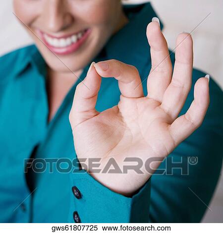 Close-up of a businesswoman making an ok sign View Large Photo Image Stock Photography - Close-up of a businesswoman making an ok sign. Fotosearch