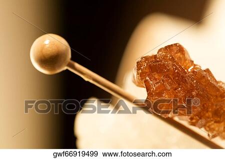 Close-up of a candy on a stick View Large Photo Image Stock Photo - Close-up of a candy on a stick. Fotosearch