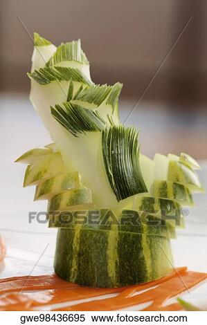 Close-up of a decorated cucumber View Large Photo Image Stock Photography - Close-up of a decorated cucumber. Fotosearch