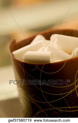 Close-up of a dessert in a chocolate cup View Large Photo Image Stock Photo - Close-up of a dessert in a chocolate cup. Fotosearch