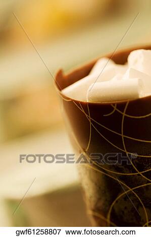 Stock Photo - Close-up of a dessert in a chocolate cup. Fotosearch