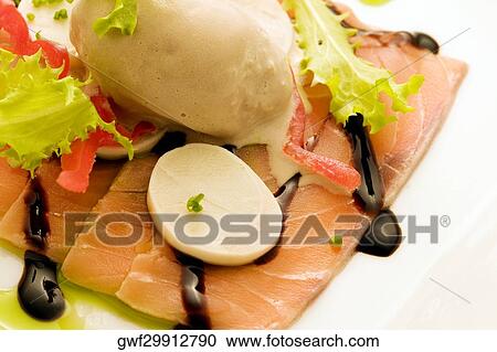 Close-up of a dish of filleted fish View Large Photo Image Stock Image - Close-up of a dish of filleted fish. Fotosearch