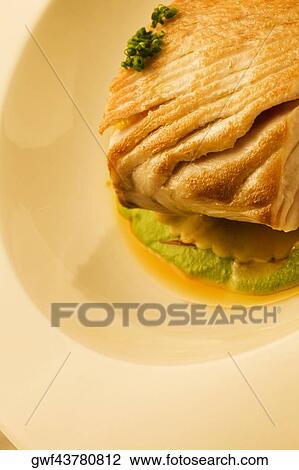 Close-up of a dish of filleted fish View Large Photo Image Stock Image - Close-up of a dish of filleted fish. Fotosearch