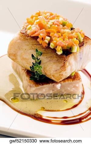 Close-up of a dish of filleted fish View Large Photo Image Stock Image - Close-up of a dish of filleted fish. Fotosearch