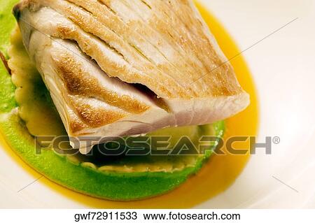Close-up of a dish of filleted fish View Large Photo Image Stock Image - Close-up of a dish of filleted fish. Fotosearch