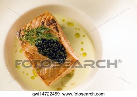 Close-up of a dish of filleted fish View Large Photo Image Stock Photo - Close-up of a dish of filleted fish. Fotosearch