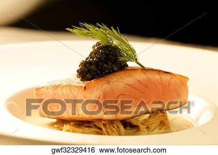 Close-up of a dish of filleted fish View Large Photo Image Stock Photograph - Close-up of a dish of filleted fish. Fotosearch