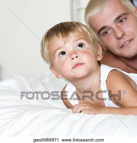 Stock Image - Close-up of a father and his son. Fotosearch