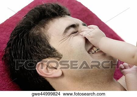 Picture - Close-up of a father with his daughter. Fotosearch