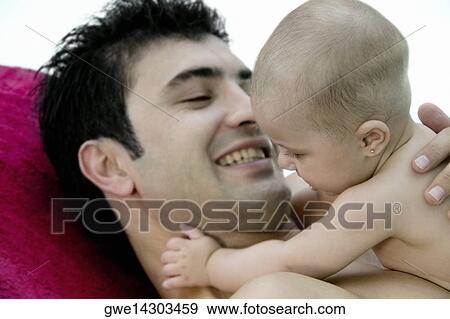 Stock Photo - Close-up of a father with his daughter. Fotosearch
