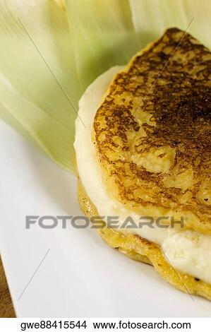Picture - Close-up of a fish fillet in a plate. Fotosearch