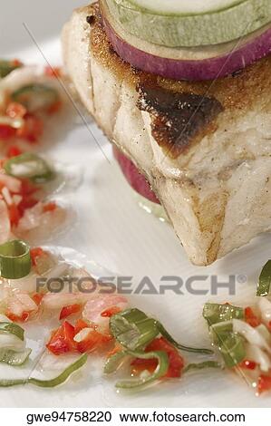 Close-up of a fish fillet in a plate View Large Photo Image Stock Image - Close-up of a fish fillet in a plate. Fotosearch